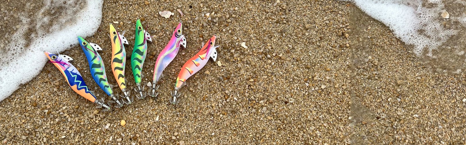 MeARi EGI squid jigs arranged by the shoreline
