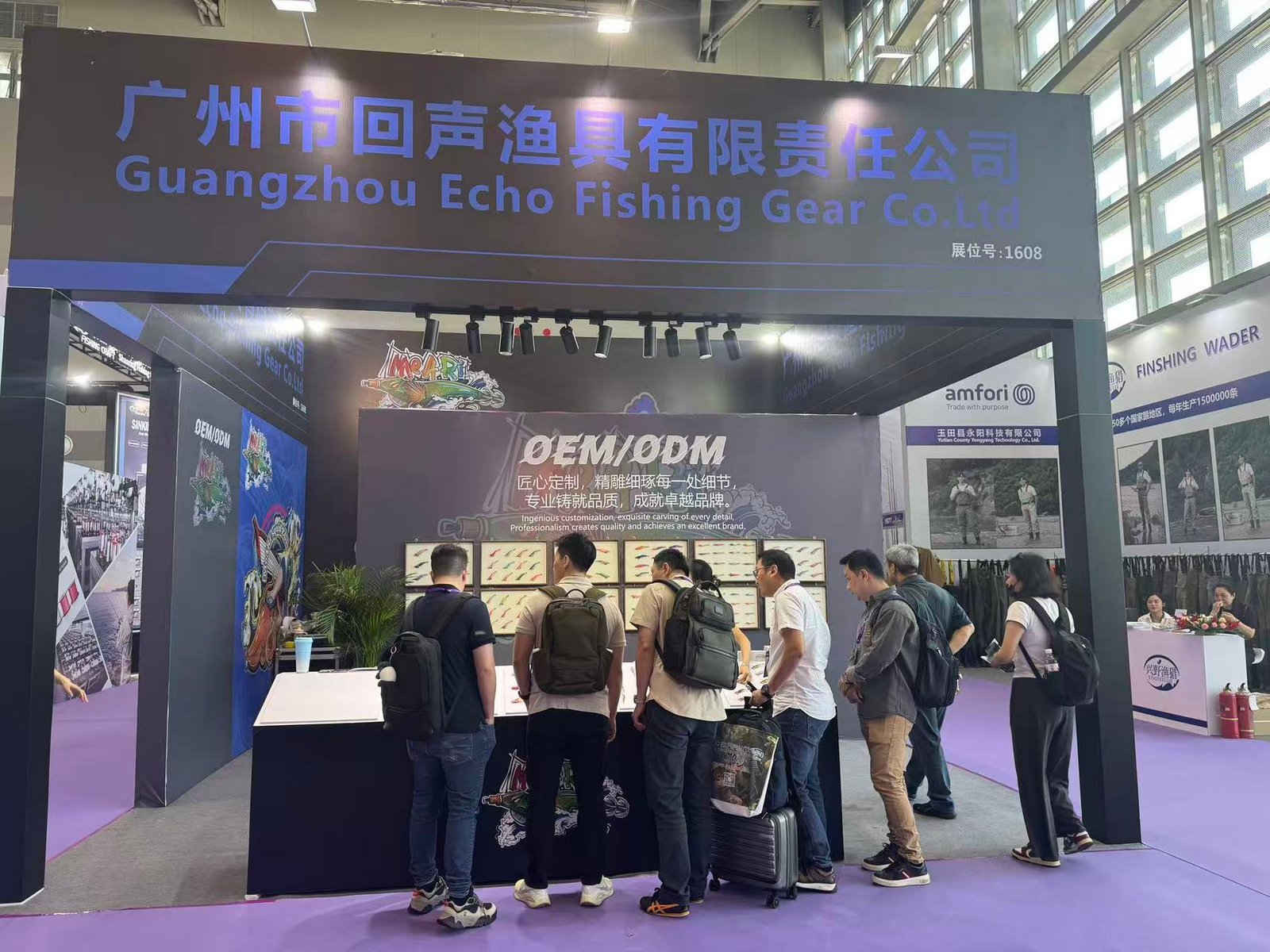 Echo Fishing Gear meeting visitors at a trade show — photo 14