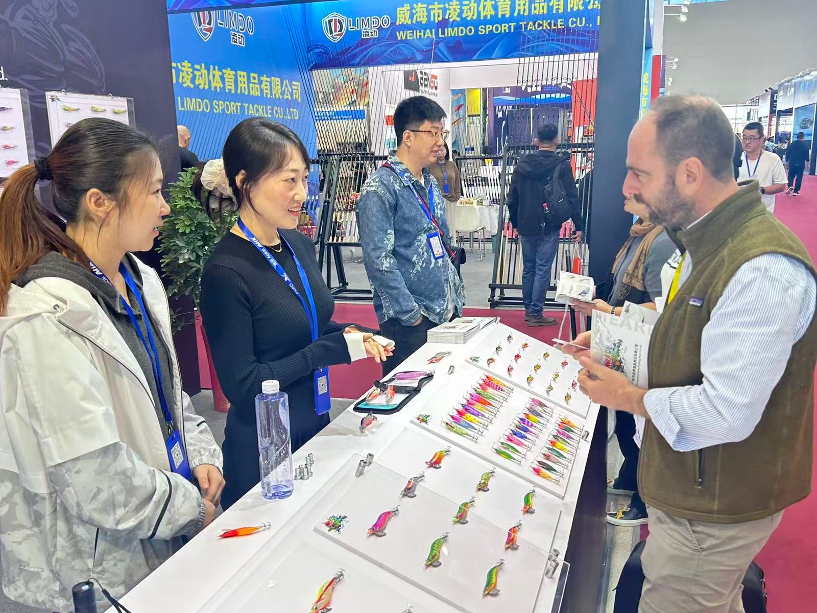 Echo Fishing Gear meeting visitors at a trade show — photo 27