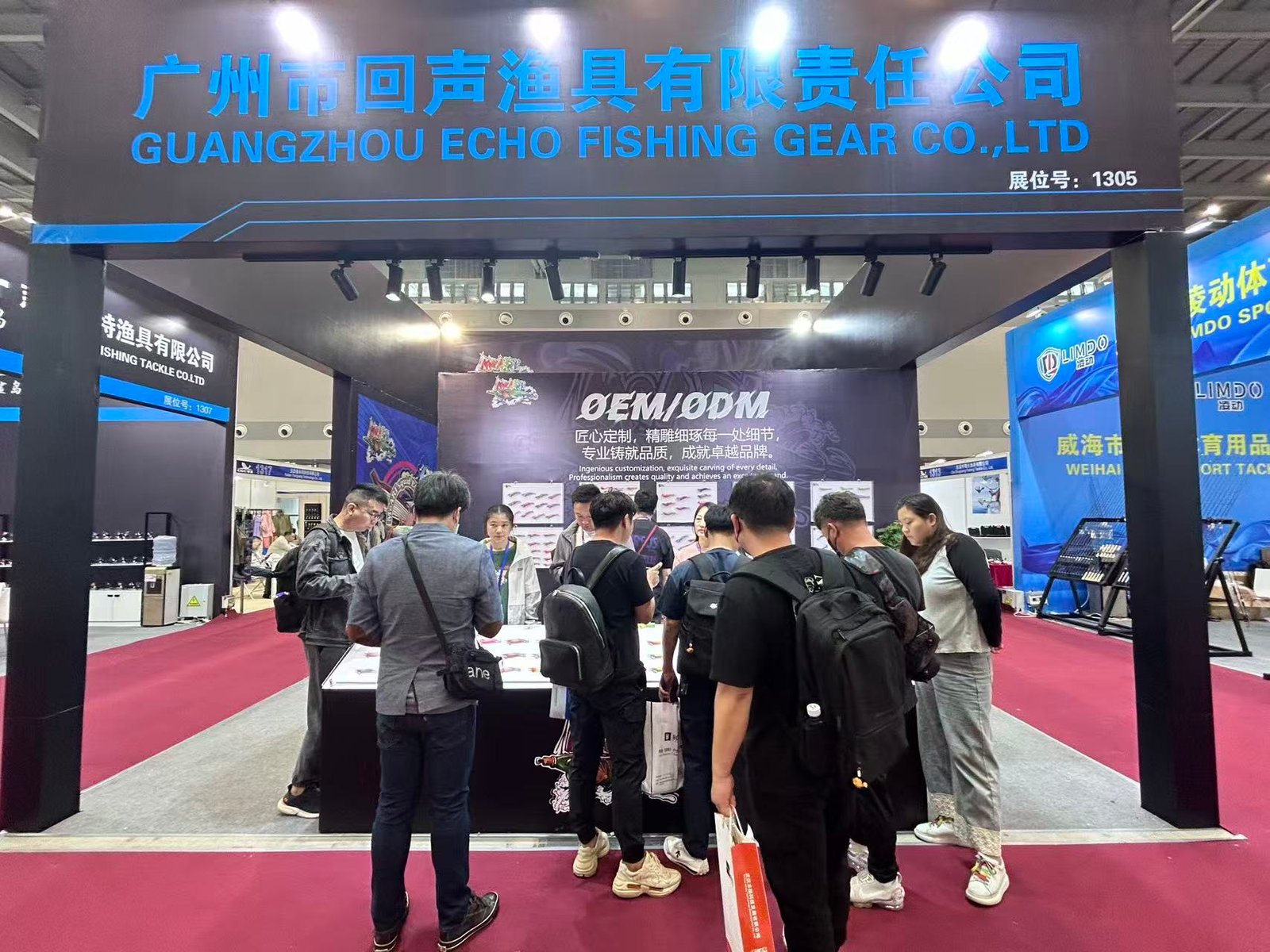 Echo Fishing Gear meeting visitors at a trade show — photo 4
